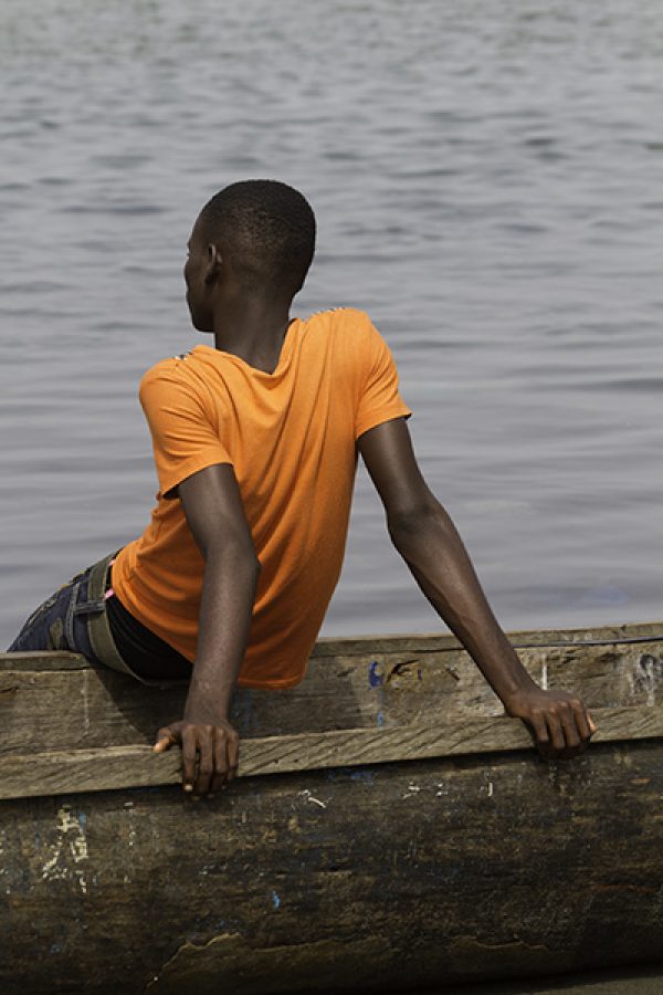 Man at the shore in West Point – Monrovia, Liberia