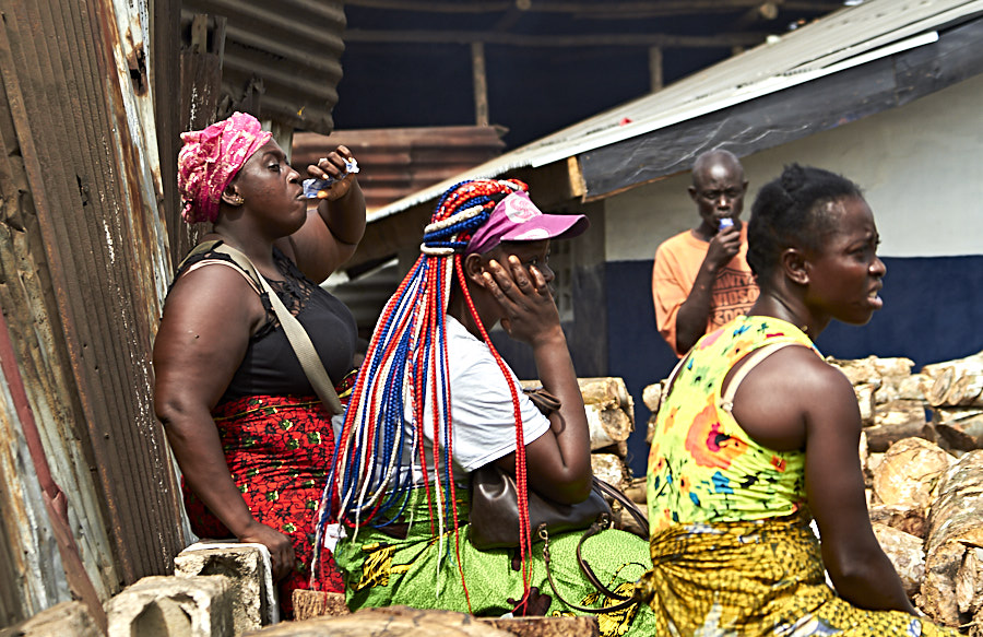 Women resting, West Point - Monrovia, Liberia - Bibi Eng